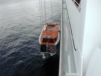 2002-08-08-19-Grand-Cayman-raising-tender-boat-on-ship.JPG