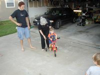 2002-08-23-04-Mark-Grammy-Dax-bike.JPG