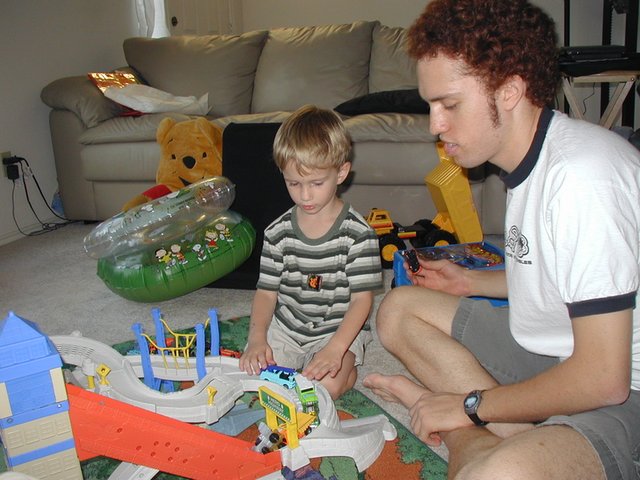 2002/10(October)/Chance-3rd-Birthday/640x480_2002-10-05-Chance-3rd-Bday-42-Mark-Matchbox-toy.JPG