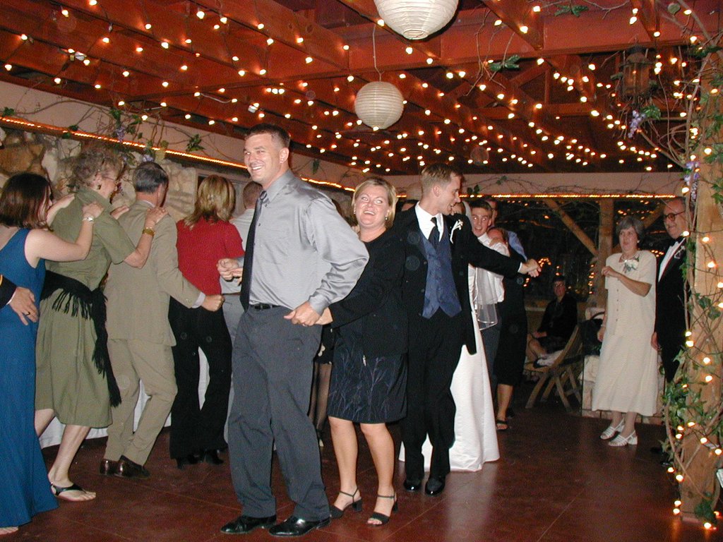2002/10(October)/Josh-Heather-Wedding/1024x768_2002-10-13-135-Josh-Heather-Wedding-conga-line.JPG