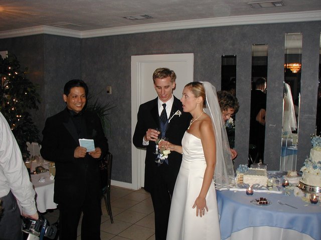 2002/10(October)/Josh-Heather-Wedding/640x480_2002-10-13-099-Josh-Heather-Wedding-toast.JPG