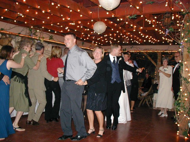 2002/10(October)/Josh-Heather-Wedding/640x480_2002-10-13-135-Josh-Heather-Wedding-conga-line.JPG