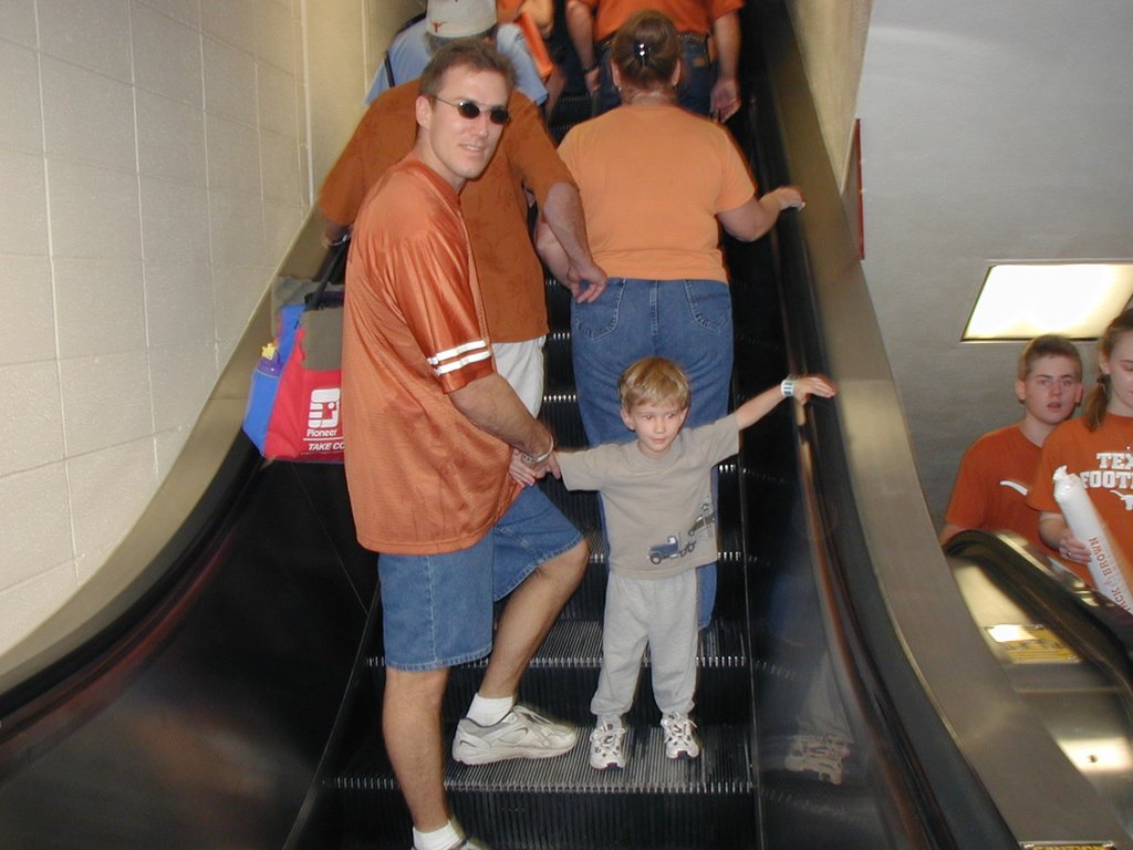 2002/11(November)/UT-football/1024x768_2002-11-09-UT-Baylor-football-04-Chance-Travis-escalator.JPG
