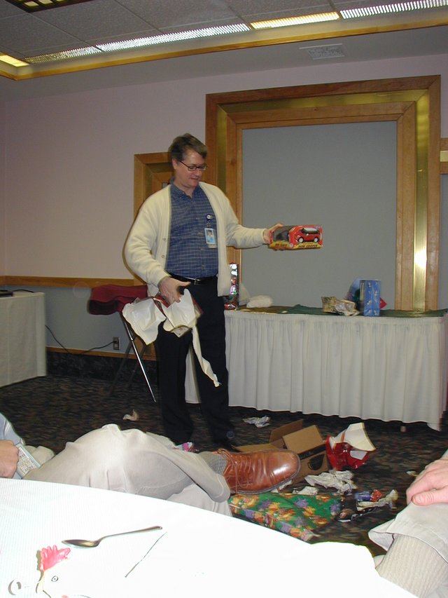 2002-12-18-AAC-Xmas-gifts-13-Rob-mini-rc-car.JPG