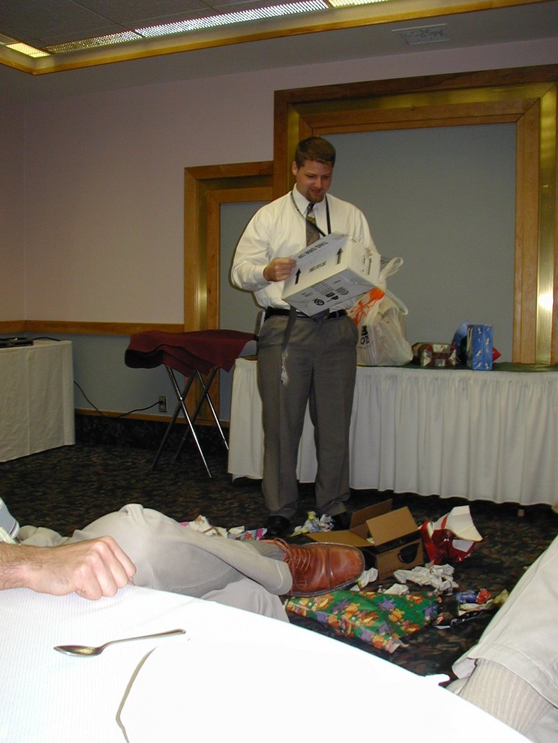 2002/12(December)/AAC-party/800x600_2002-12-18-AAC-Xmas-gifts-08-James-empty-box.JPG
