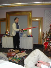 2002-12-18-AAC-Xmas-gifts-15-Rob-light-sabers.JPG