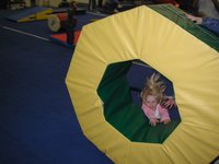 2002-12-07-Aaron-bday-19-McKenzie-falling-from-donut.JPG
