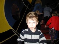 2002-12-07-Aaron-bday-43-Dax-in-caterpiller.JPG