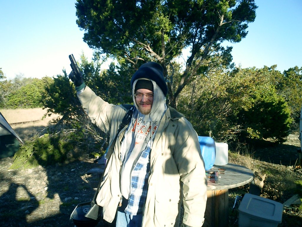2002/12(December)/Hunting-Camping/1024x768_2002-12-12-Texas-Hunting-08-James-pistol.JPG
