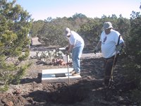 2002-12-12-Texas-Hunting-14-Steve-Val-outhouse-hole.jpg