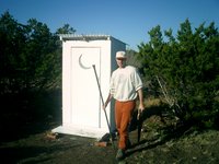 2002-12-12-Texas-Hunting-33-Travis-outhouse.JPG