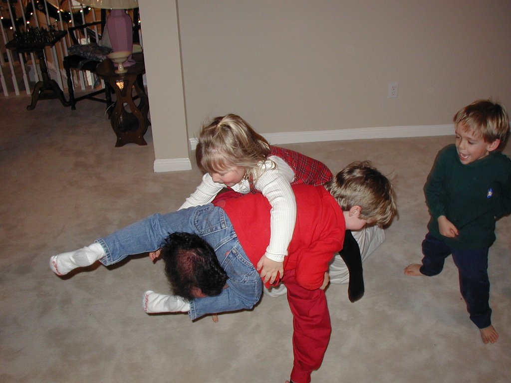 2002/12(December)/Maddox-Xmas-Party/1024x768_2002-12-08-Maddox-Party-04-Jim-Brittney-Aaron-Jack.JPG