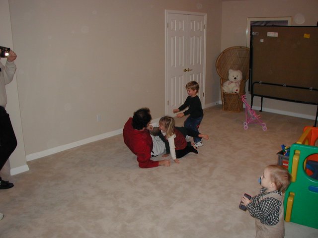 2002-12-08-Maddox-Party-03-Jim-Brittney-Chance-Case.JPG