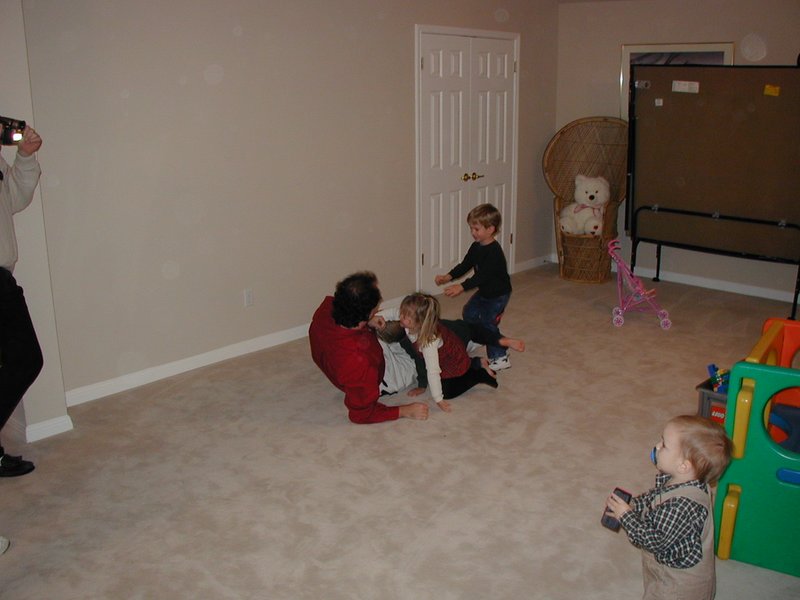 2002/12(December)/Maddox-Xmas-Party/800x600_2002-12-08-Maddox-Party-03-Jim-Brittney-Chance-Case.JPG