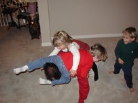 2002-12-08-Maddox-Party-04-Jim-Brittney-Aaron-Jack.JPG