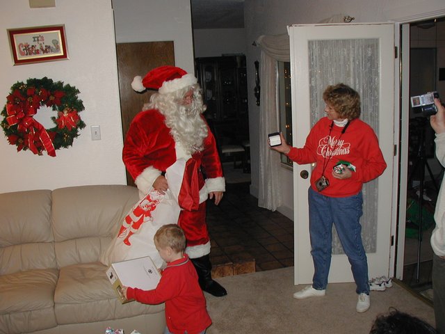 2002-12-24-Xmas-21-Santa-Janeen-earrings.JPG