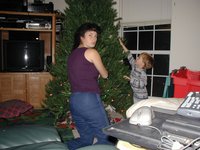 2002-11-31-Decorating-Xmas-tree-Suzi-Chance-1.JPG