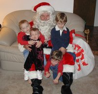 2002-12-24-Xmas-23-Santa-Chance-Vale-Kyla-Dax-group-shot.JPG