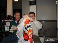 2002-12-24-Xmas-40-Travis-Justin-golf-gloves.JPG