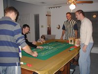 2002-12-25-Xmas-24-Josh-Cory-Dax-Travis-Justin-craps.JPG