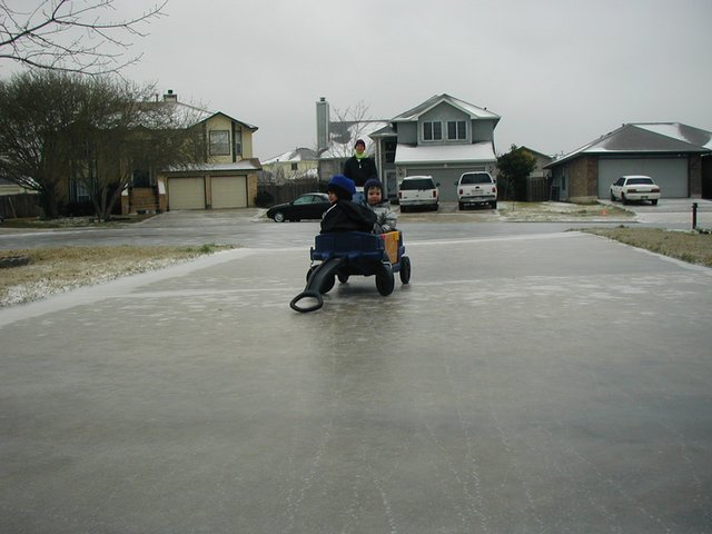 2003-02-25-Frozen-Austin-08-Chance-Dax-Travis-wagon.JPG