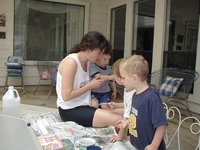 2003-04-13-Easter-11-dye-eggs-Chance-Dax-Suzi-Vale.JPG