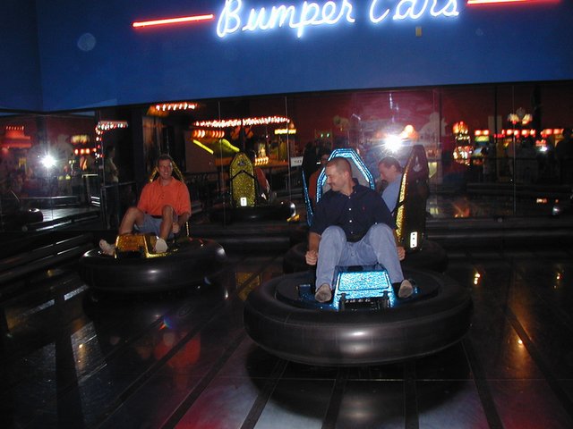 2003-05-07-Dax-Bday-21-GattiTown-Travis-Mike-bumper-cars.JPG