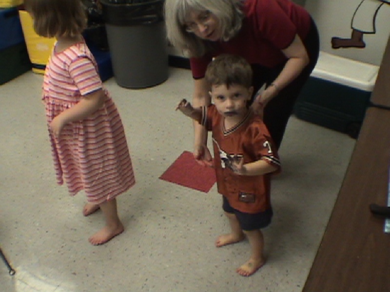 2003-10-05-Chance-Bday-7-Sony-Camcorder-Dax-cake-face-Grammy.JPG