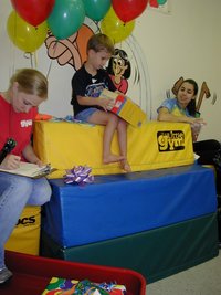 2003-10-05-Chance-Bday-39-Little-Gym-presents.JPG
