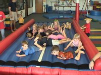 2003-10-05-Chance-Bday-4-Sony-Camcorder-all-kids-on-bounce-mat.JPG