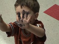2003-10-05-Chance-Bday-8-Sony-Camcorder-Dax-cake-hands.JPG