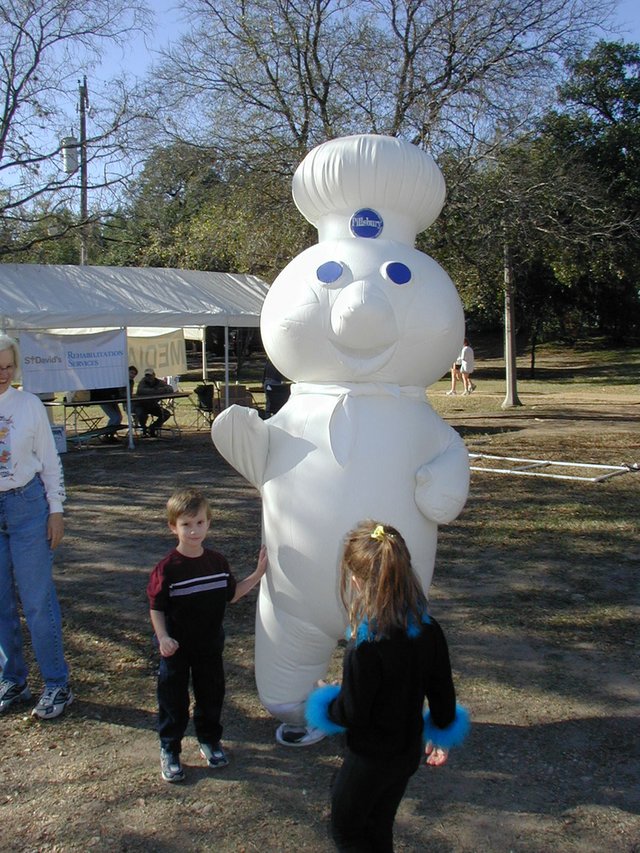 2003-11-27-Thanksgiving-06-Turkeytrot-Chance-pillsbury-doughboy.JPG
