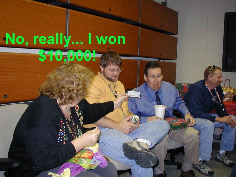 2003-12-18-AAC-Xmas-17-Cyndi-lotto-ticket-James-Steve-Ray.JPG
