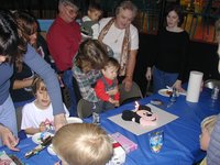 2003-12-13-Aaron-bday-8-Brendan-cake.JPG
