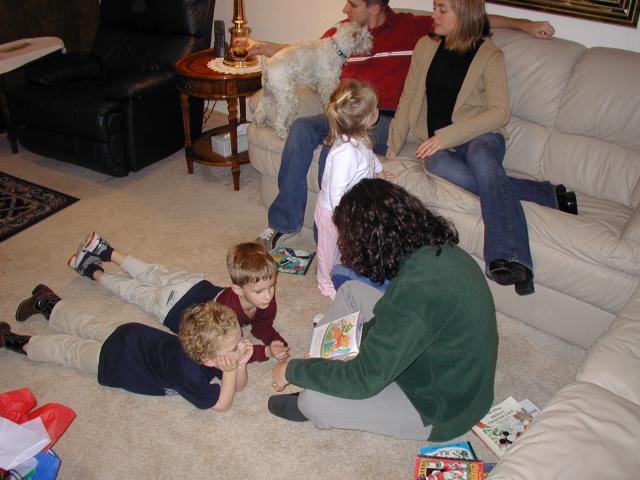 2003/12(December)/Christmas/640x480_2003-12-24-Xmas-eve-04-reading-Chance-Vale-Kyla-Suzi-Packet-Josh-Heather.JPG