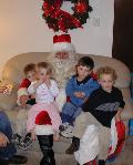 2003-12-24-Xmas-eve-13-Santa-Chance-Dax-Vale-Kyla.JPG