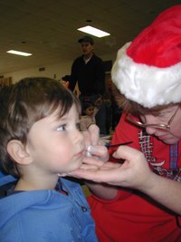2003-12-06-Church-Santa-breakfast-03-Dax-facepaint.JPG