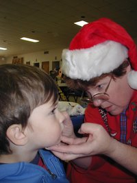 2003-12-06-Church-Santa-breakfast-05-Dax-facepaint.JPG