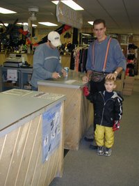 2004-01-18-Ruidoso-02-Chance-Travis-renting-skis.JPG