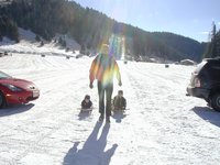 2004-01-18-Ruidoso-05-Chance-Dax-Travis-sledding.JPG