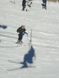 2004-01-19-Ruidoso-18-Grammy-skiing-Travis-Chance-shadow-on-chairlift.JPG