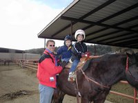 2004-01-21-Ruidoso-14-horseback-riding-Travis-Chance-Dax.JPG