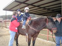 2004-01-21-Ruidoso-15-horseback-riding-Travis-Chance-Dax.JPG