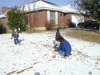 2004-02-14-Snow-in-Austin-17-Chance-Dax-Marlene.JPG
