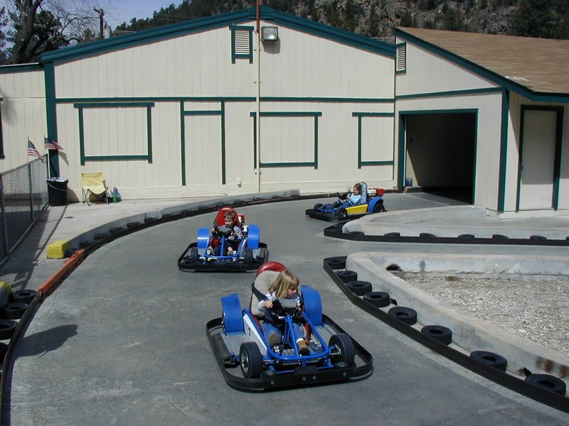2004-03-16-Ruidoso-18-Chance-McKenzie-Brittney-racing-cars.JPG