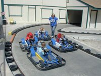 2004-03-16-Ruidoso-09-Chance-Brittney-McKenzie-racing-cars.JPG