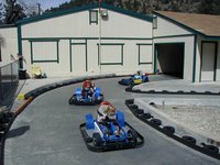 2004-03-16-Ruidoso-18-Chance-McKenzie-Brittney-racing-cars.JPG
