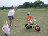 2004-04-04-Heather-Bday-10-Travis-Chance-no-training-wheels-Kyla.JPG