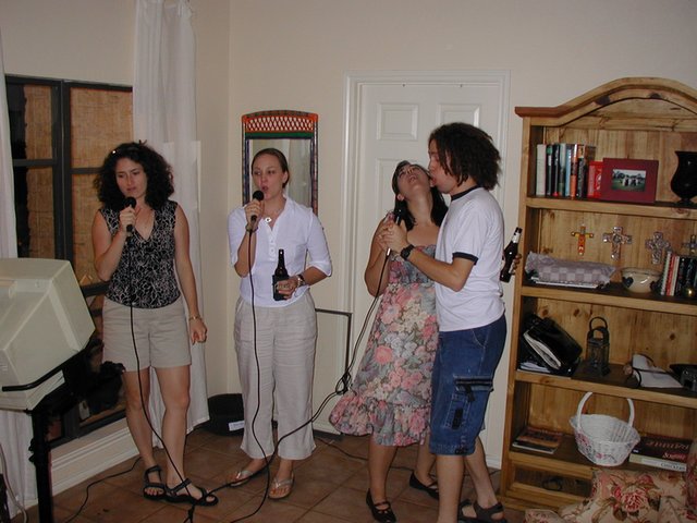 2004-05-21-Vanessa-graduation-party-2-karoake-Suzi-Mark.JPG
