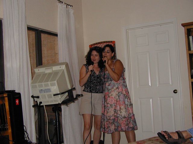 2004-05-21-Vanessa-graduation-party-4-karoake-Suzi.JPG